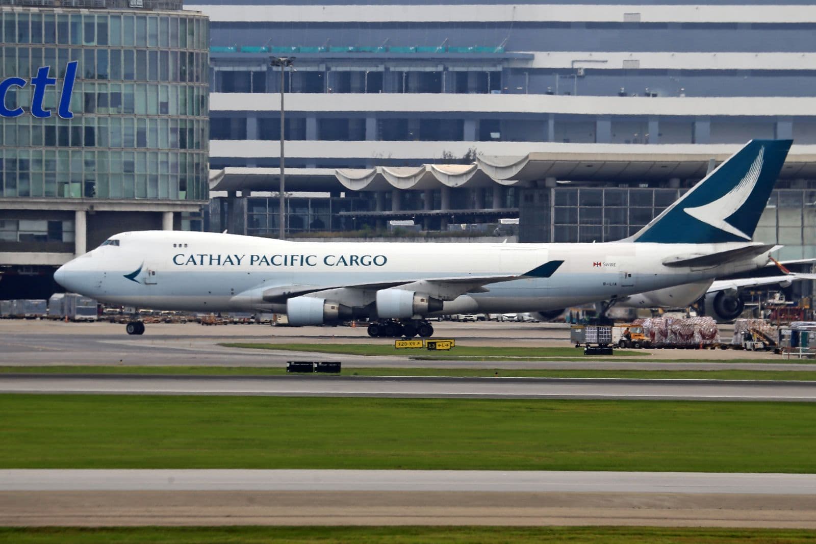 Boeing 747 freighter on the airport apron loaded for cargo operations.