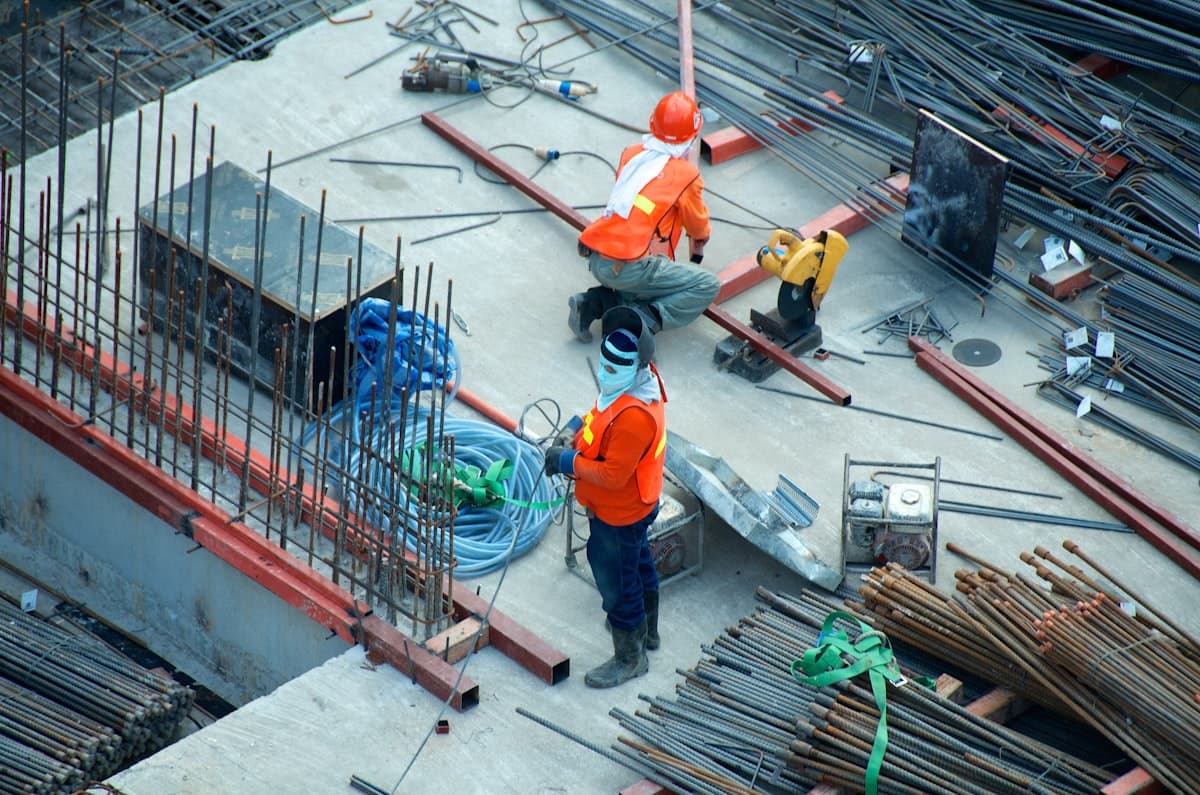 Heavy construction machinery prepared for oversized cargo transport.